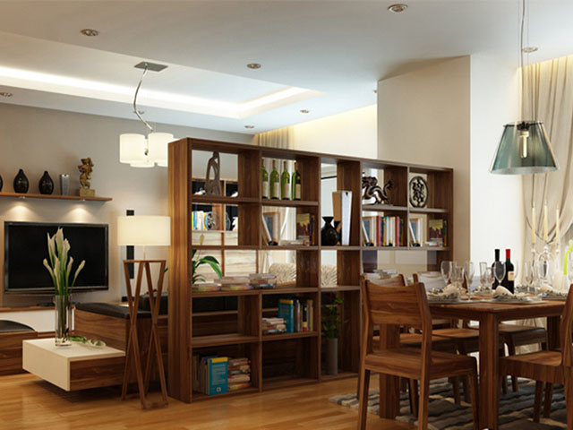 Giá sách được coi như là vách ngăn giữa khu vực phòng khách và phòng ăn tạo nét tinh tế